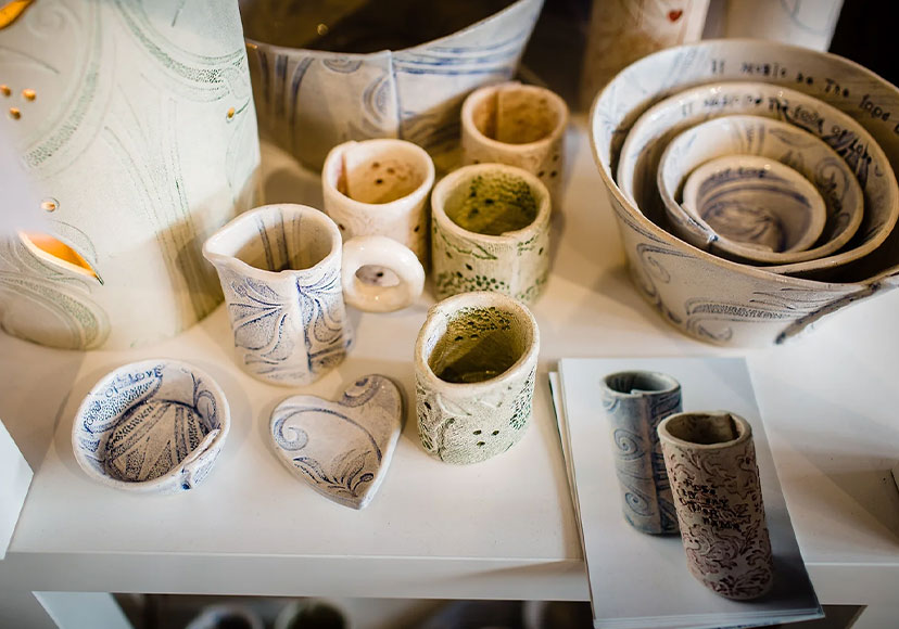 Unique ceramic pieces textured using wallpaper.